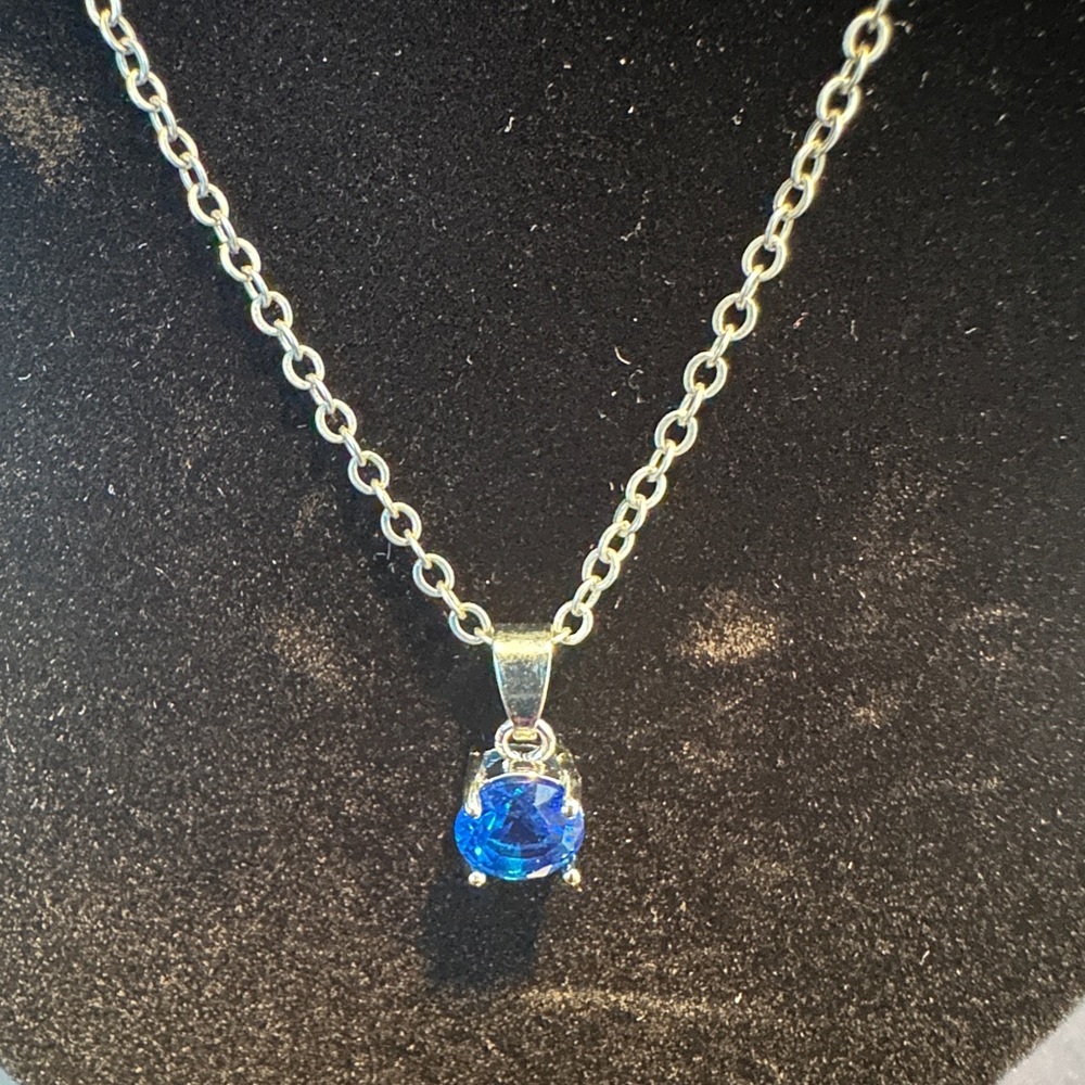 Elegant Silver Necklace with Blue Pendant